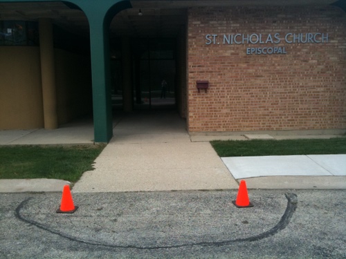St Nicholas Episcopal "happy face" with traffic cones and construction paint