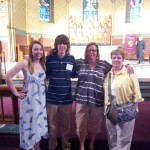 Anna and Tommy Dowd, with their mother and grandmother, after being confirmed at St James Cathedral.