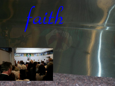 Faith: the people of St Nicholas gathering near the font, which reflects the stained glass windows