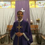 Father Manny in Lenten purple, 2015